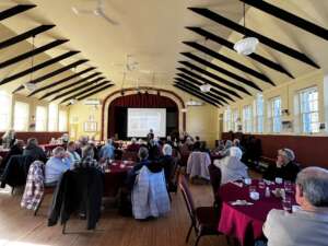 Rosseau caring community monthly lunch learn attendees learning 4x3 custom