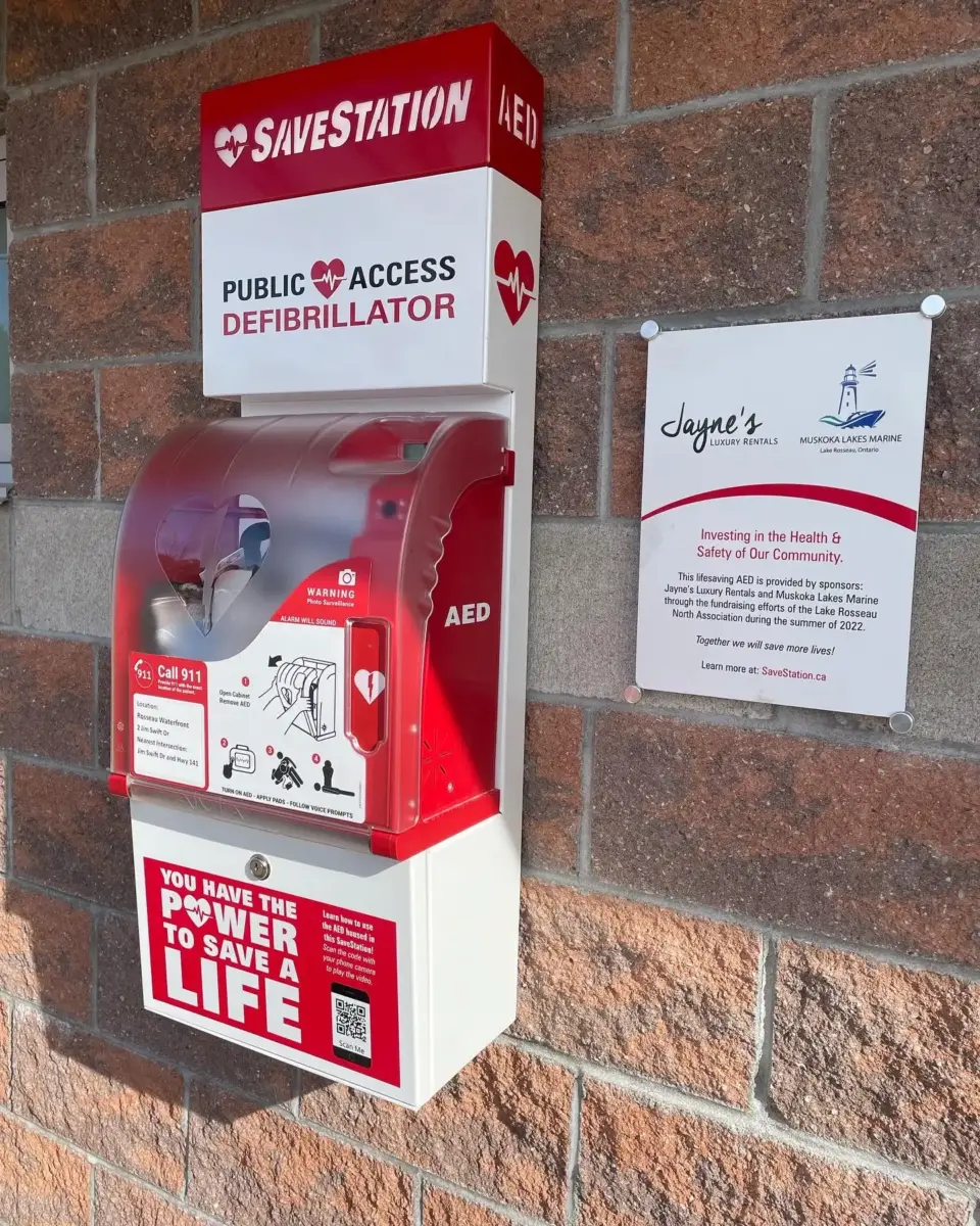 A Save Station hanging on a wall which gives the public access to a portable defibrillator.